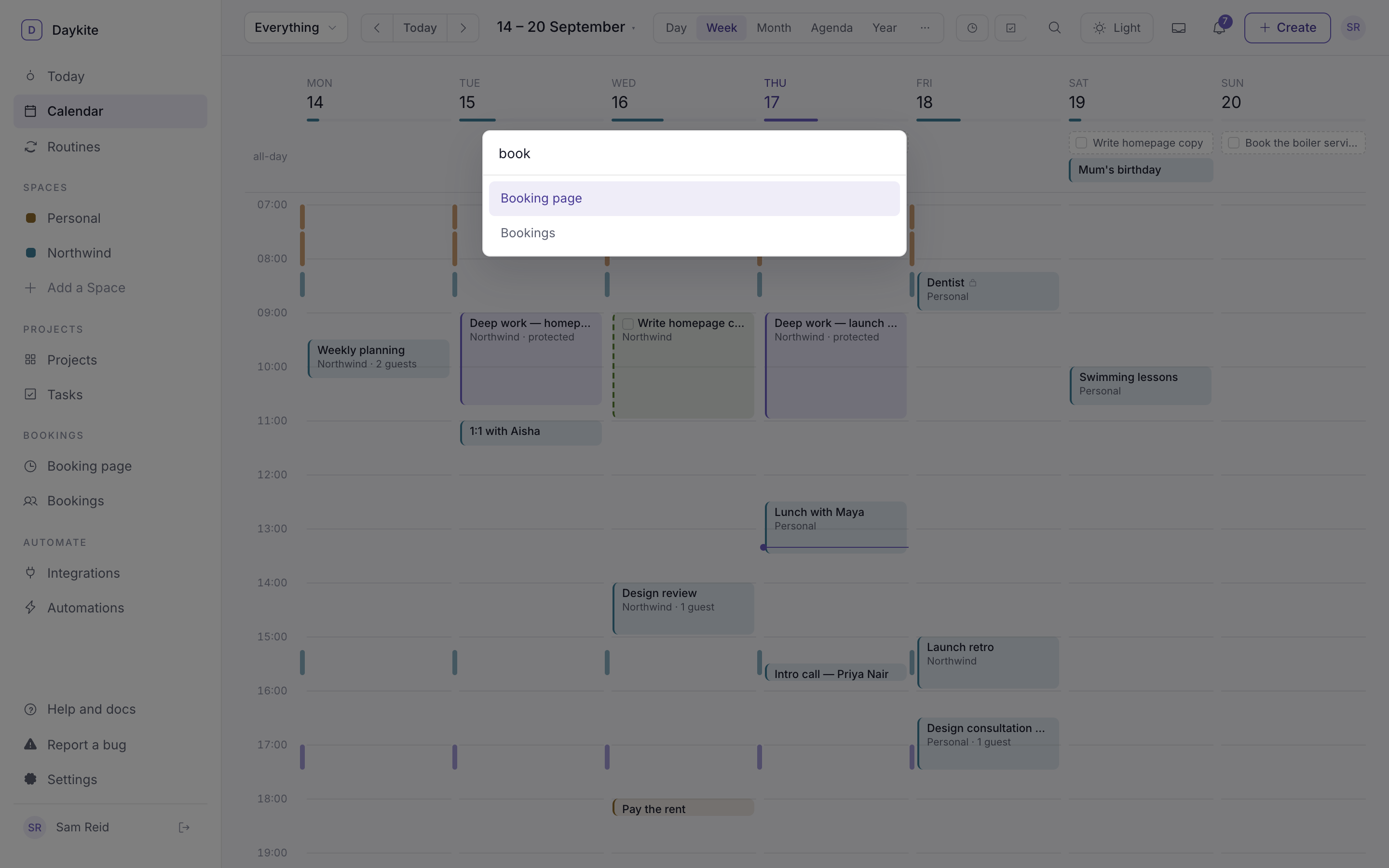 The command palette open over the calendar, filtered to "book"